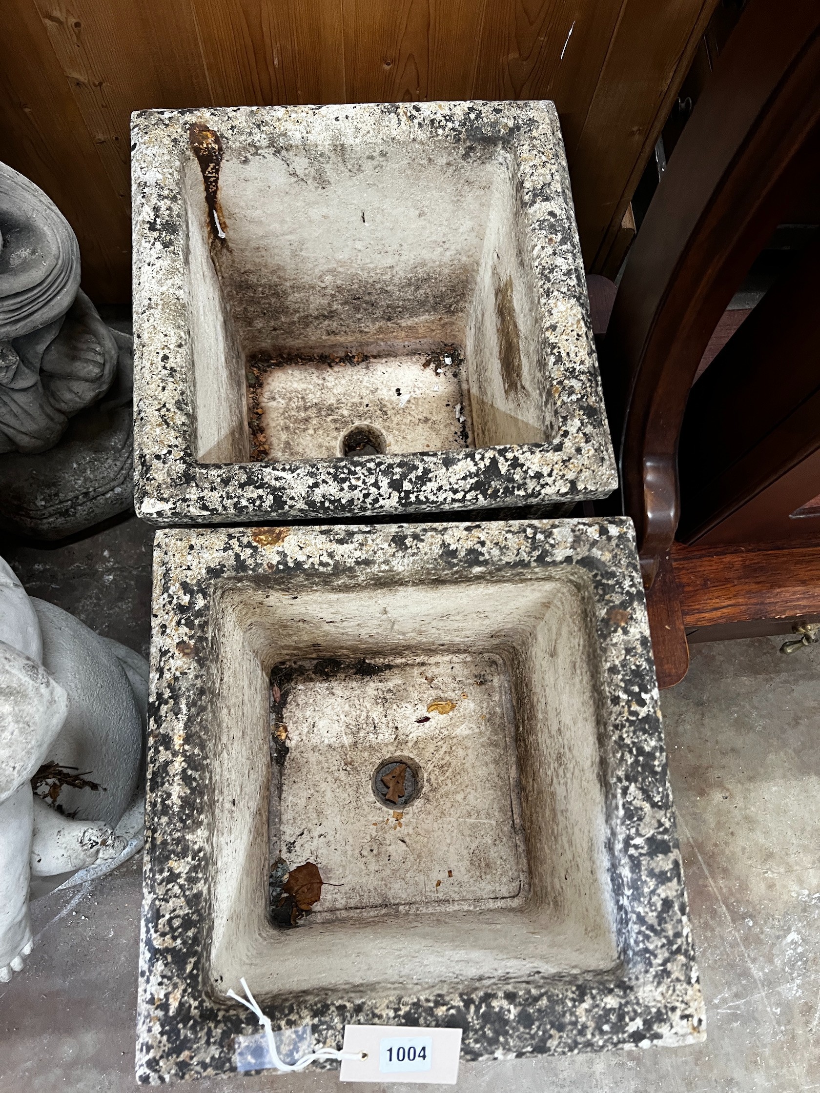 A pair of square reconstituted stone garden planters, width 35cm height 35cm